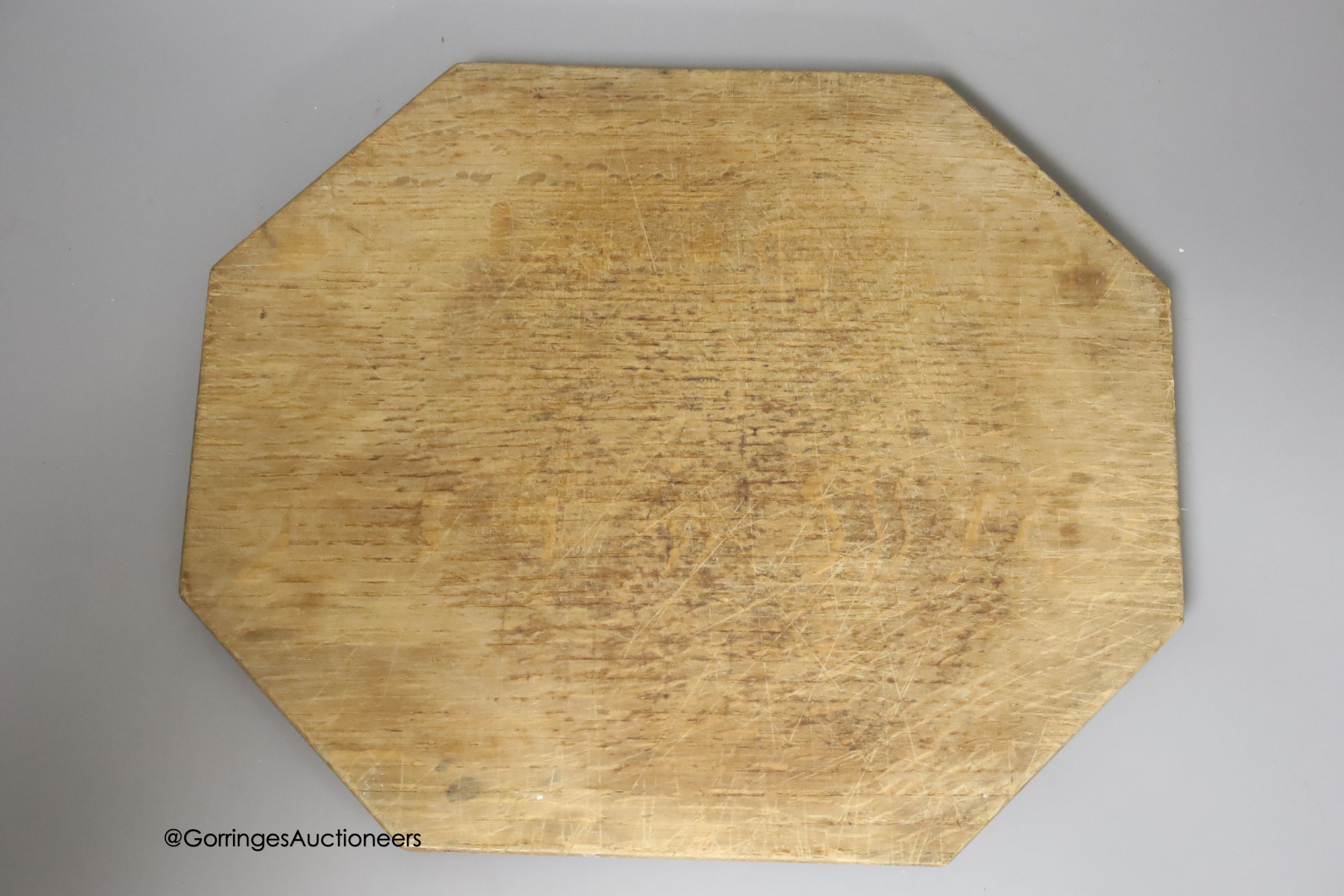 A Mouseman octagonal cheese board, 30cm, and a small Mouseman bowl, 15cm